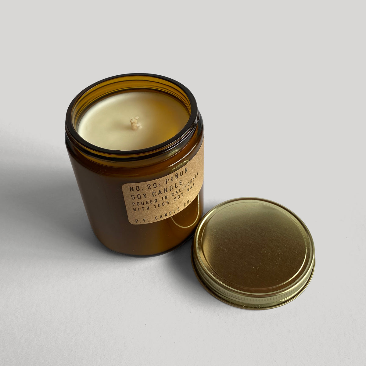 P.F. Candle Co. 7.2oz Soy Candle Pinõn HAMMERPRESS